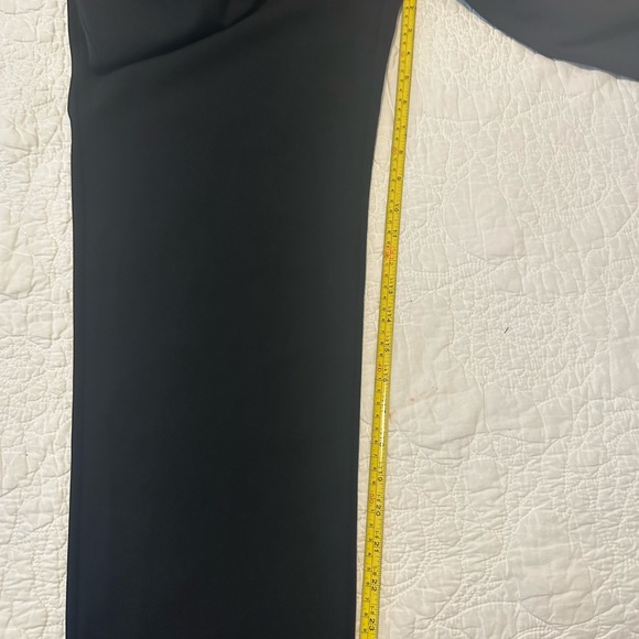 Express Black stretch jumpsuit. Low v neck front & opening below breast line. - Picture 8 of 9